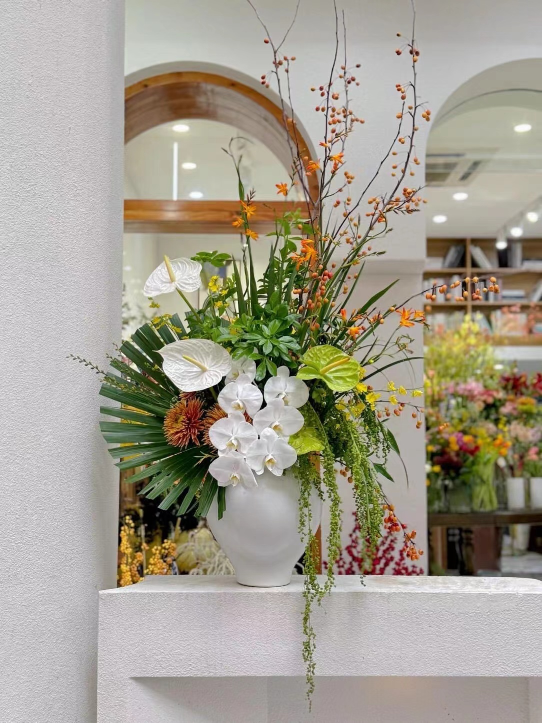 Mira Fleur corporate floral — installation, mira palette