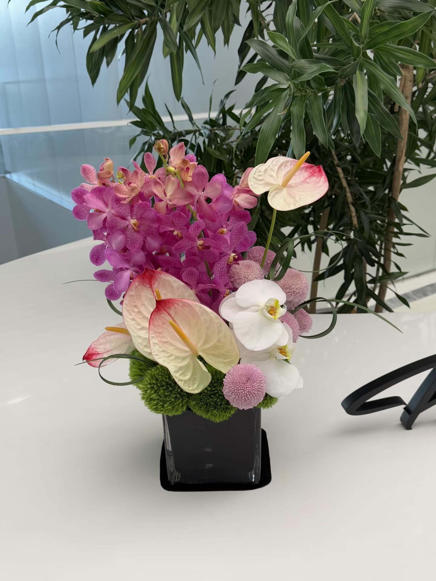 Mira Fleur corporate floral — installation, mira palette