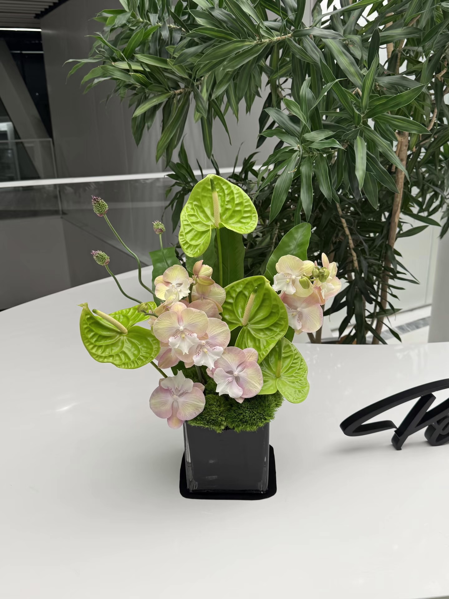 Mira Fleur corporate floral — installation, mira palette