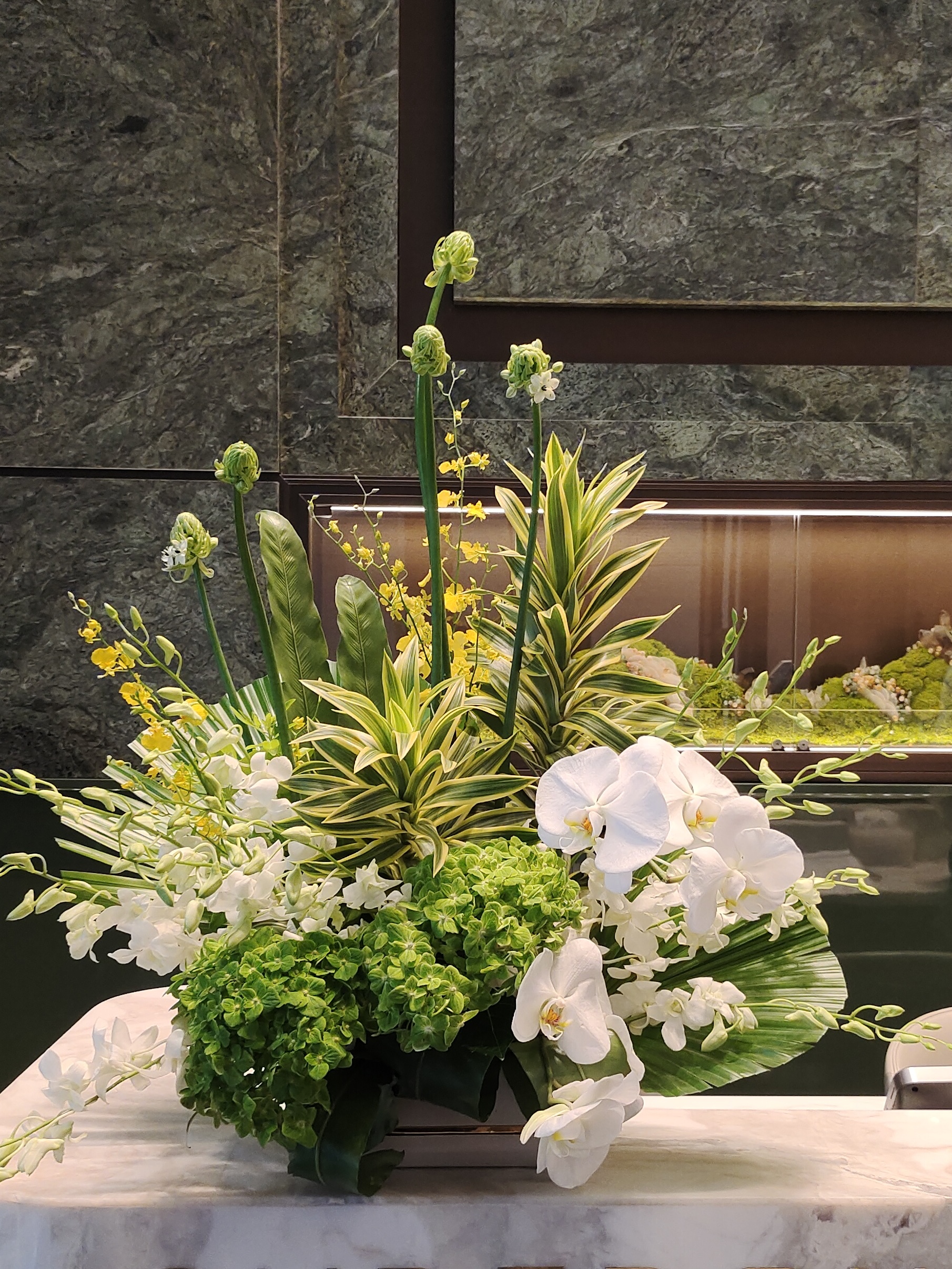 Mira Fleur corporate floral — installation, mira palette