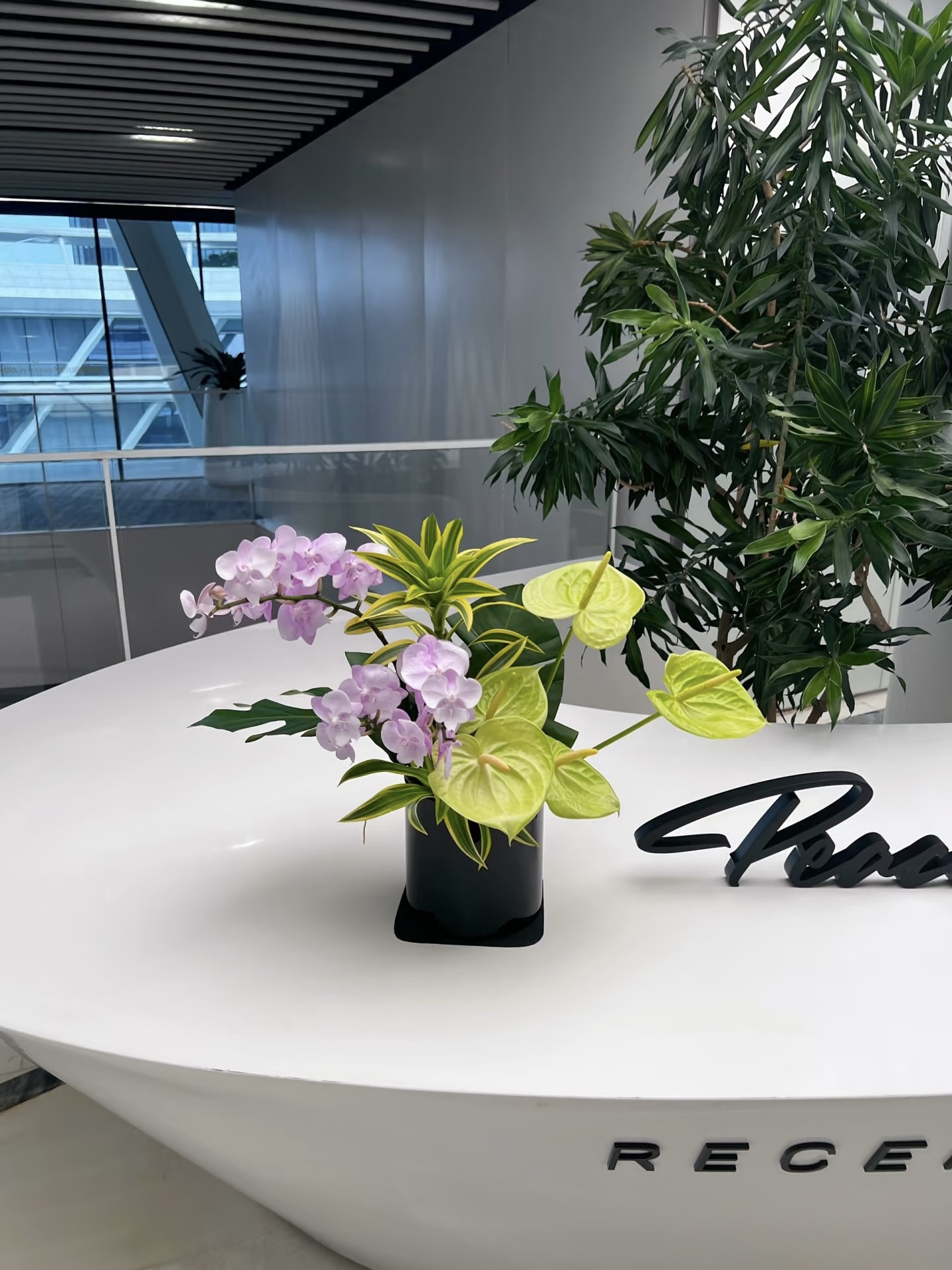 Mira Fleur corporate floral — installation, mira palette